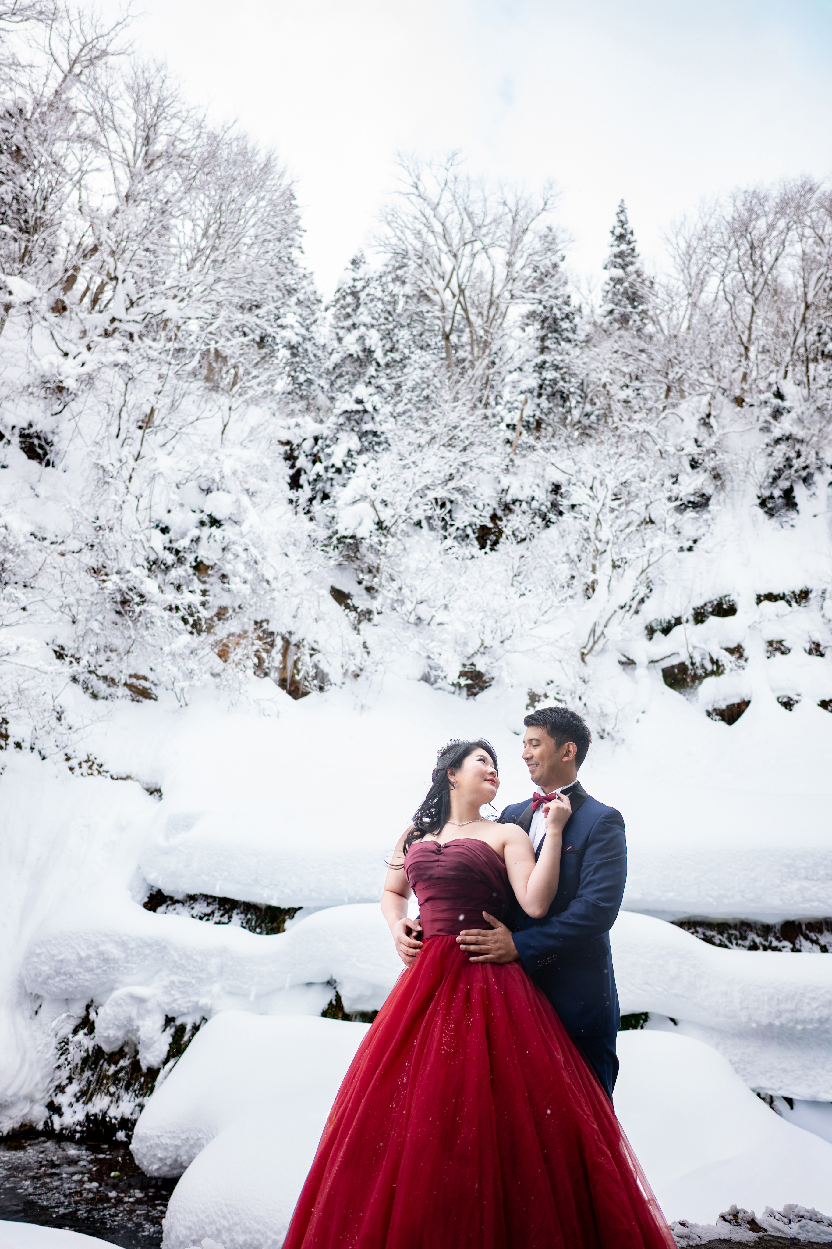 Cropped photo of the exterior of the top floor of an old stone building.